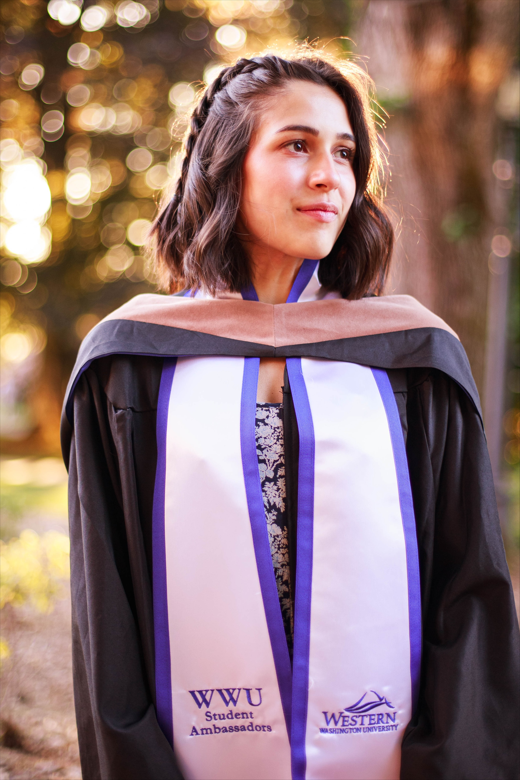 WWU Outstanding Grad Student Anna Cortines with gown, hood, and other regalia
