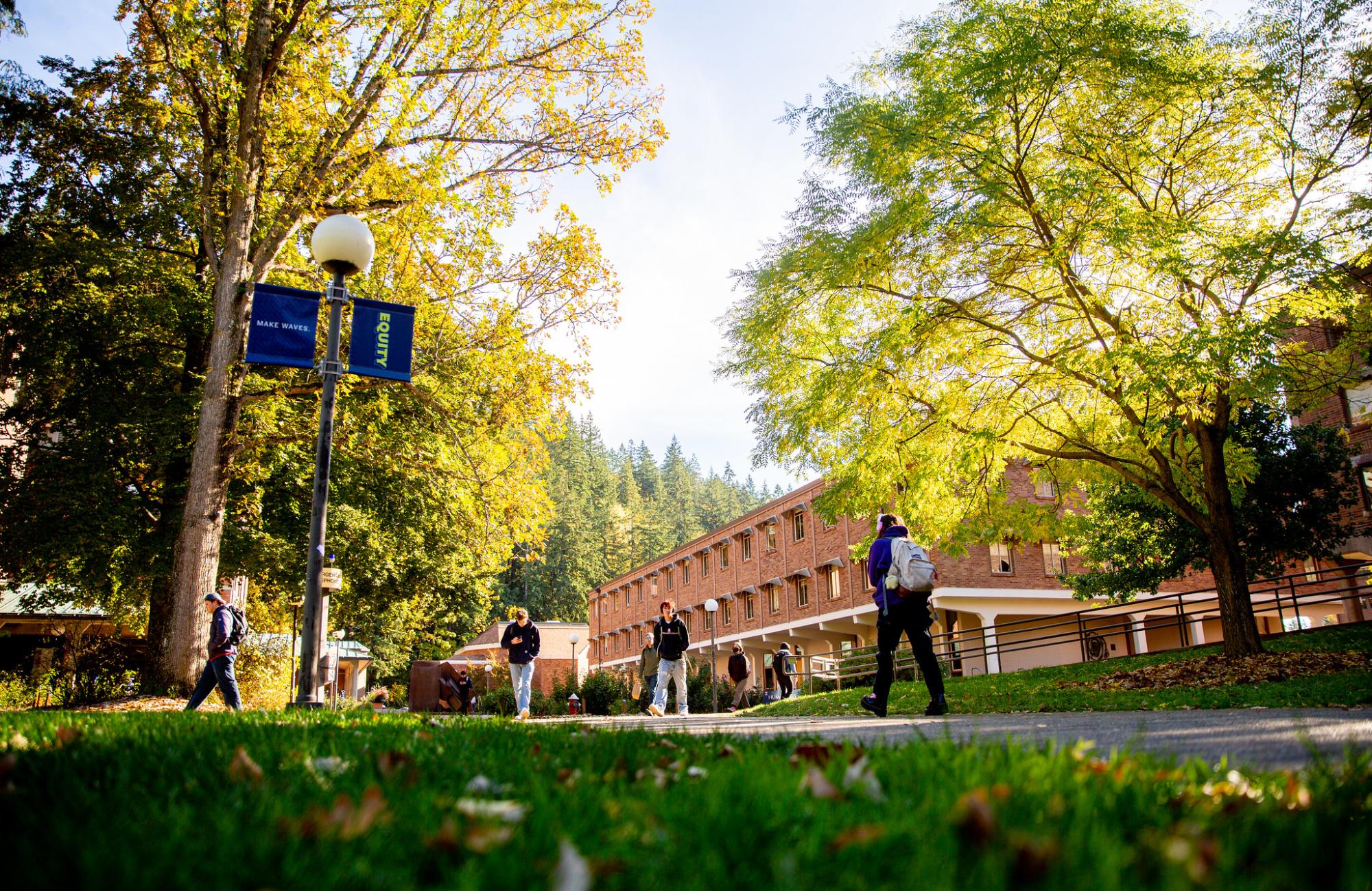 WWU Campus with red brick building, lawn, and trees